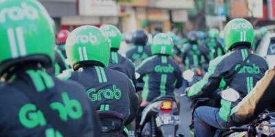 Grab Terpaksa PHK 360 Karyawan