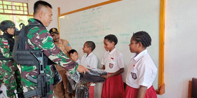 Minat Belajar Anak Tolikara Meningkat Berkat Satgas Pamtas Yonif Raider 142/KJ 