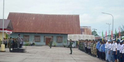 Satgas Yonif Raider 600 Modang Laksanakan Upacara HUT Ke-77 TNI di Mako Polres Asmat