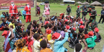 Kemeriahan Acara Gerbang Natal Satgas Yonif Mekanis 203/AK Bersama Masyarakat Distrik Malagay