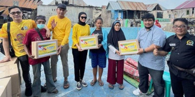 Ketua Umum DPP PEKAT IB Aga Khan Kirim Bantuan untuk Korban Kebakaran di Desa Ibul Besar, Ogan Ilir