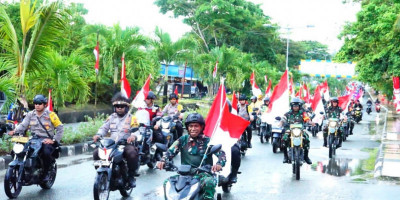 Kobarkan Semangat Kemerdekaan, Dandim 1708/BN Pimpin Pawai Bendera Merah Putih di Biak
