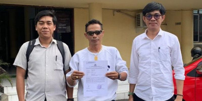 Gelar Dr (c) Jadi Sorotan, Stafsus Gubernur Sulut Dilaporkan ke Polisi