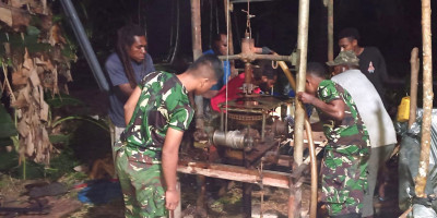 Kerja Hingga Malam, Satgas TMMD Kodim 1708/BN Kebut Pengeboran Sumur Air Bersih