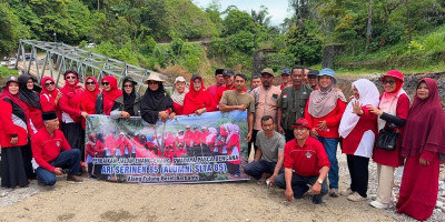 Serinen 85 Salurkan 151 Sak Semen untuk Perbaikan Jalan Enang-Enang