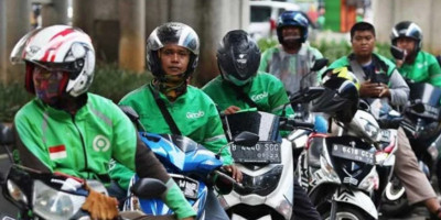 Skema Bagi Hasil Buah Perjuangan Panjang Pengemudi Ojek Online dan DPR